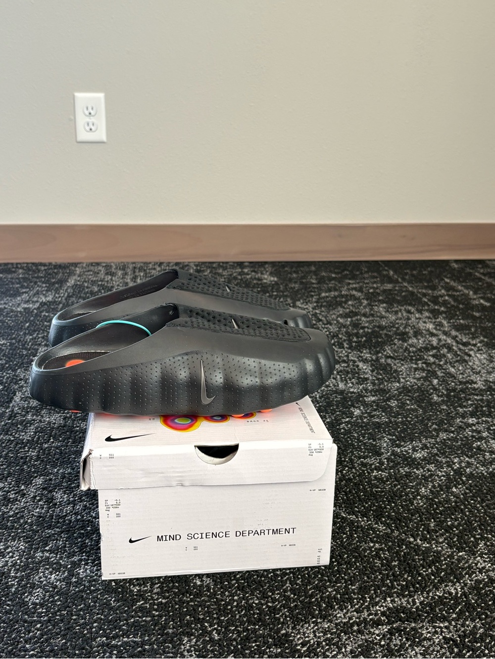 Nike Men’s Black Perforated Slip-On Sandals with Teal Accent